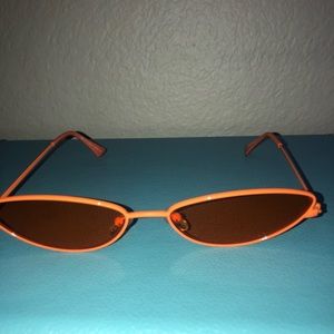 orange triangular sunglasses